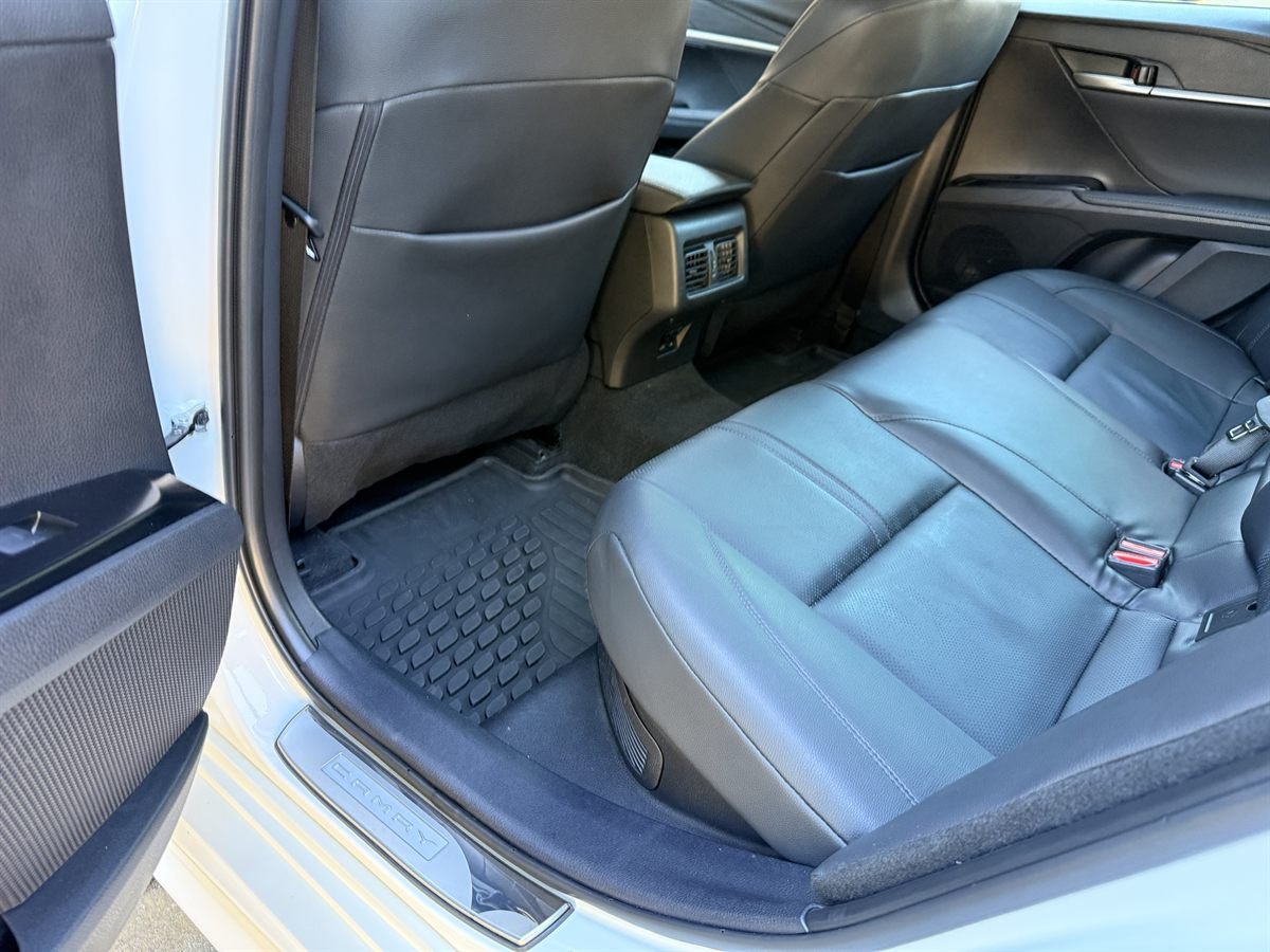 The rear seat and floor after detailing, with the floor mats cleaned